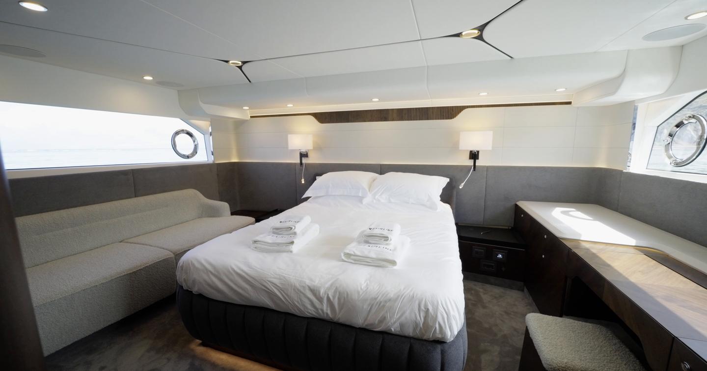 Fairline Targa 58 GTO full-beam owner's cabin with double bed and sofa