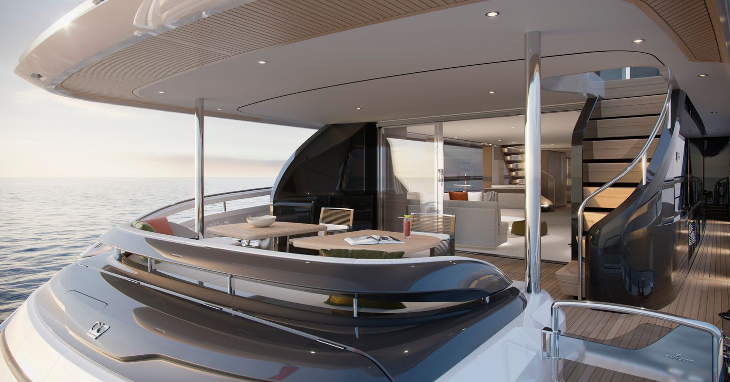 The X95 has a dining area with scenic views above its tender garage