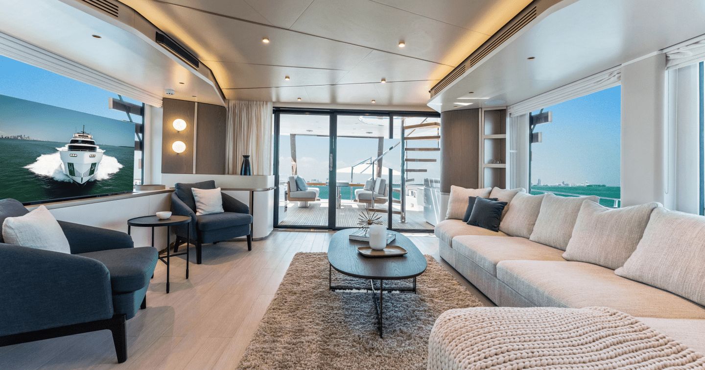 Motor Yacht Equites's interior L-shaped sofa and living area