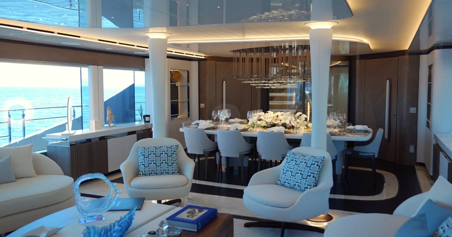 Superyacht Camila main saloon with dining area