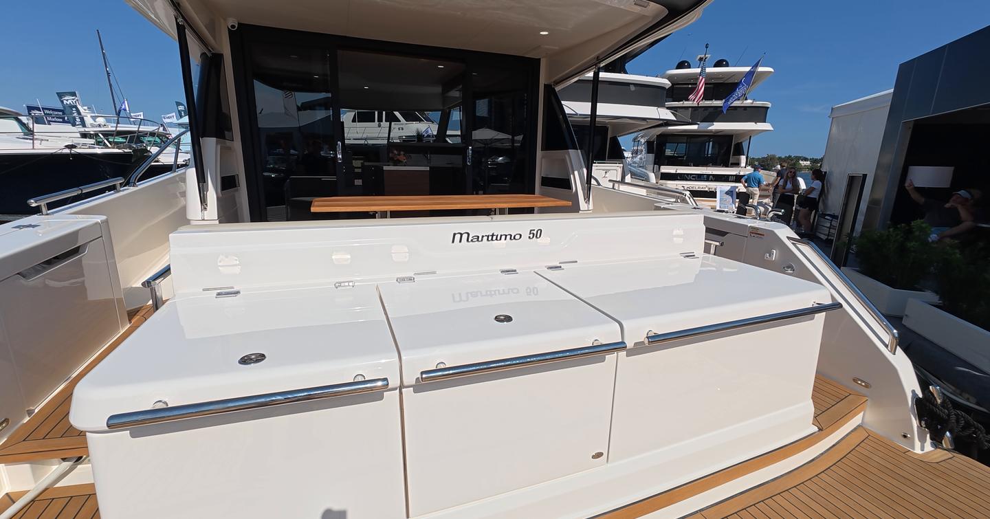 Maritimo M50 cockpit transom storage and seating module with integrated handles and deck access