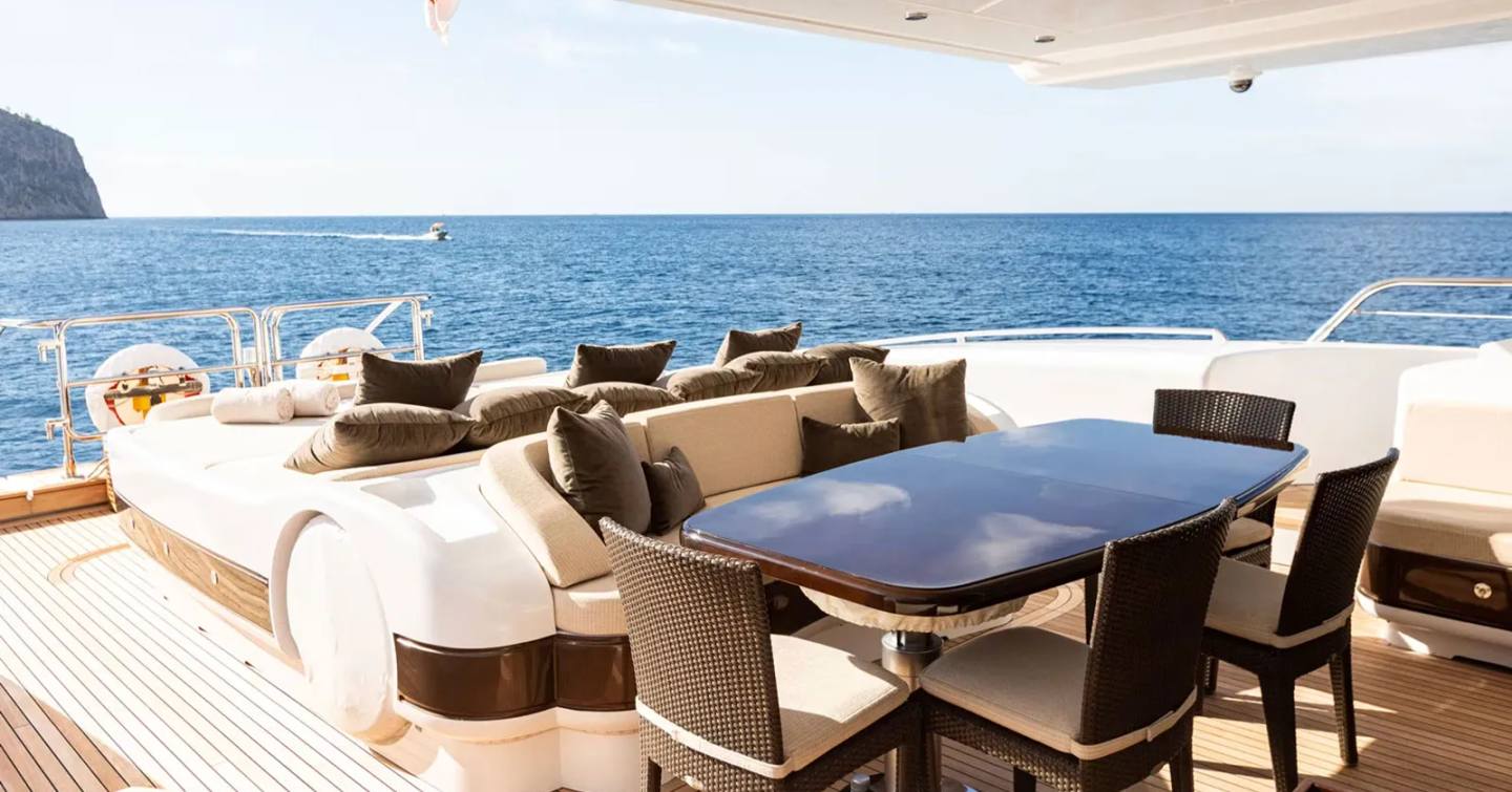 Motor yacht Plan A's shaded dining area 