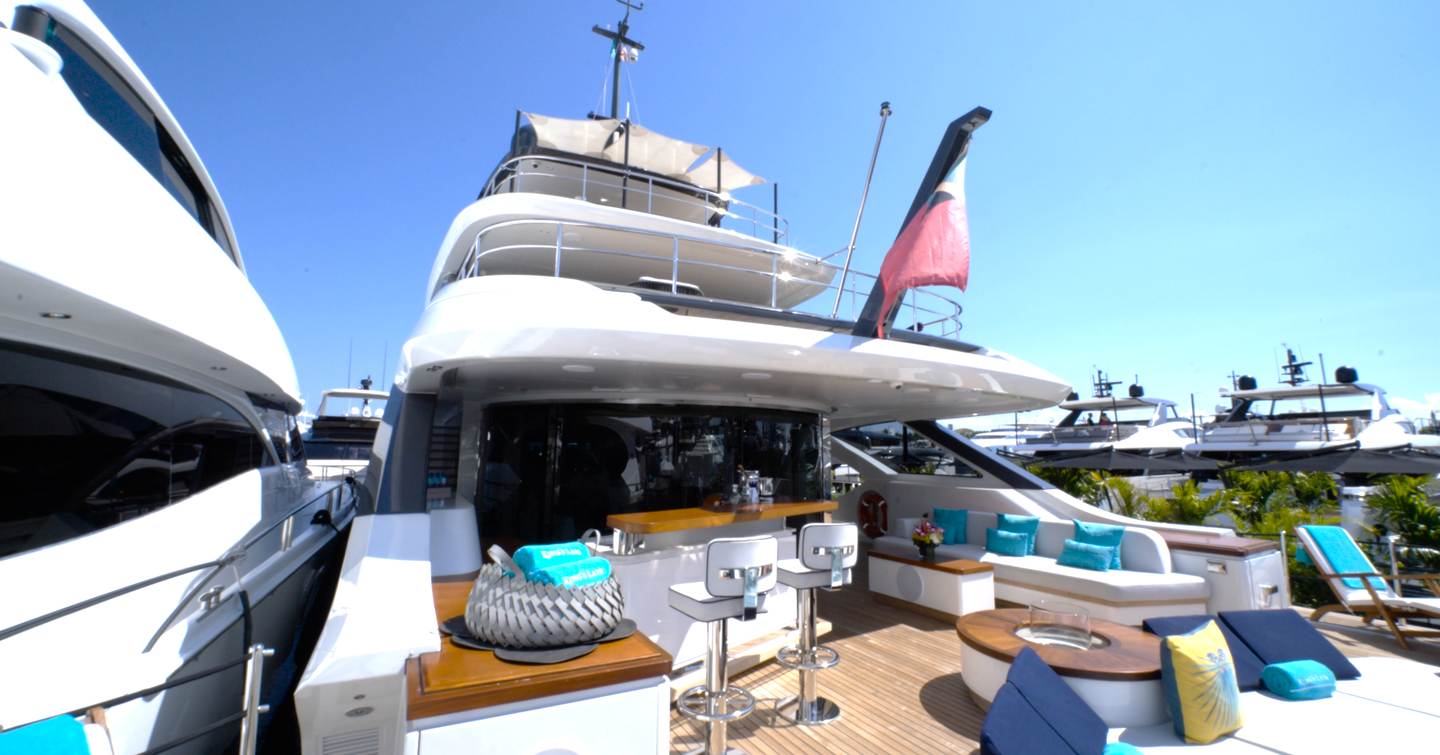Benetti Oasis 34M Oasis Deck featuring the aft lounge, pool, wet bar and open connection to the main saloon.