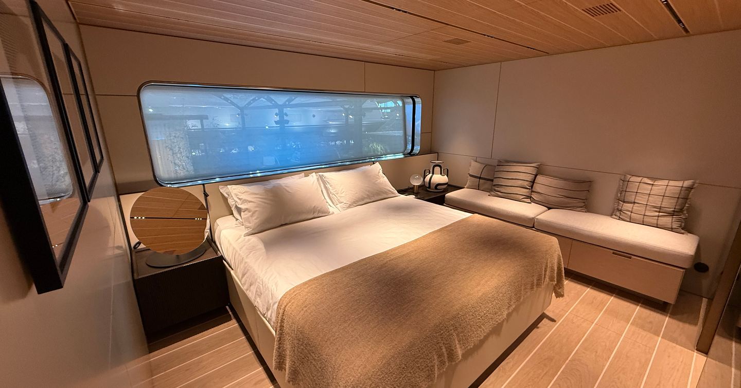 Bluegame-BGX83-Review-owner-cabin-double-berth-and-lounge-sofa