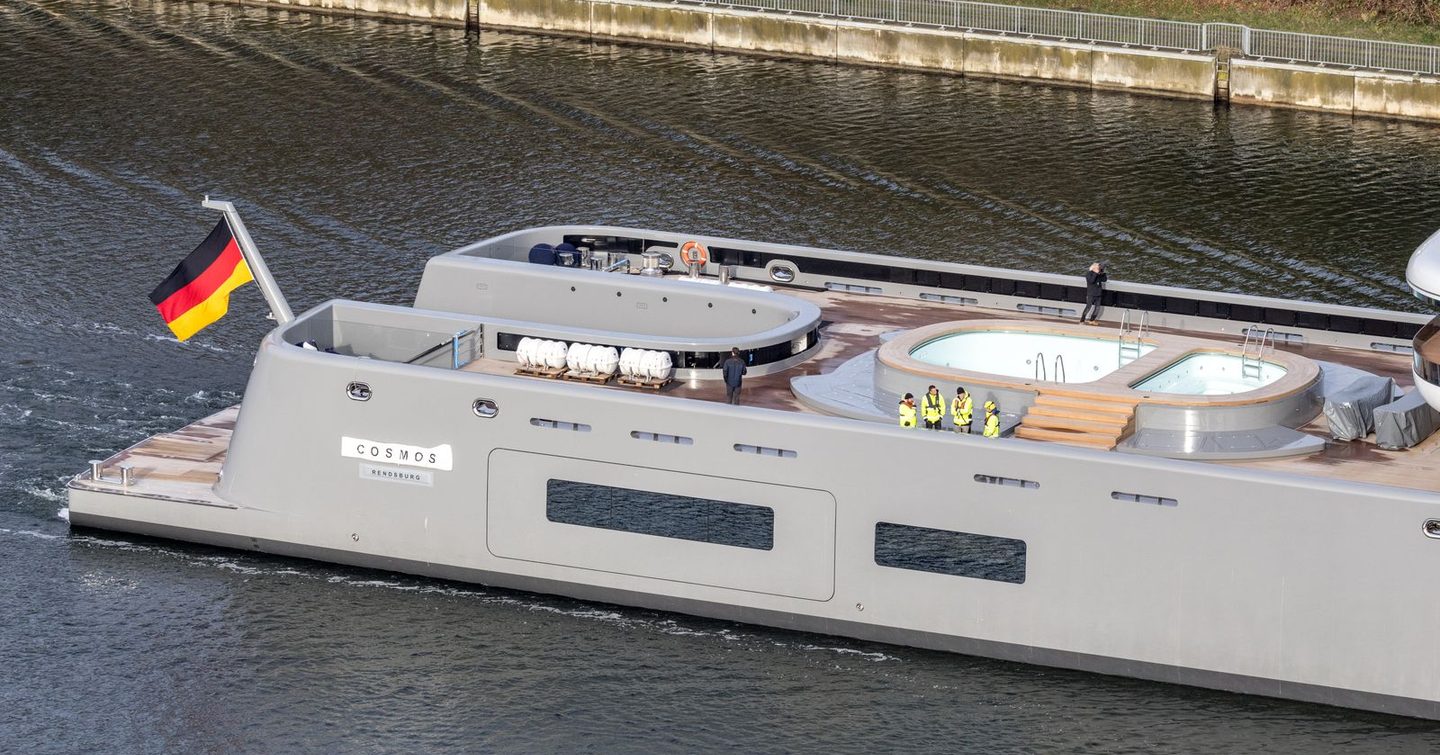 Workers on Superyacht Project Cosmos aft with swimming pool