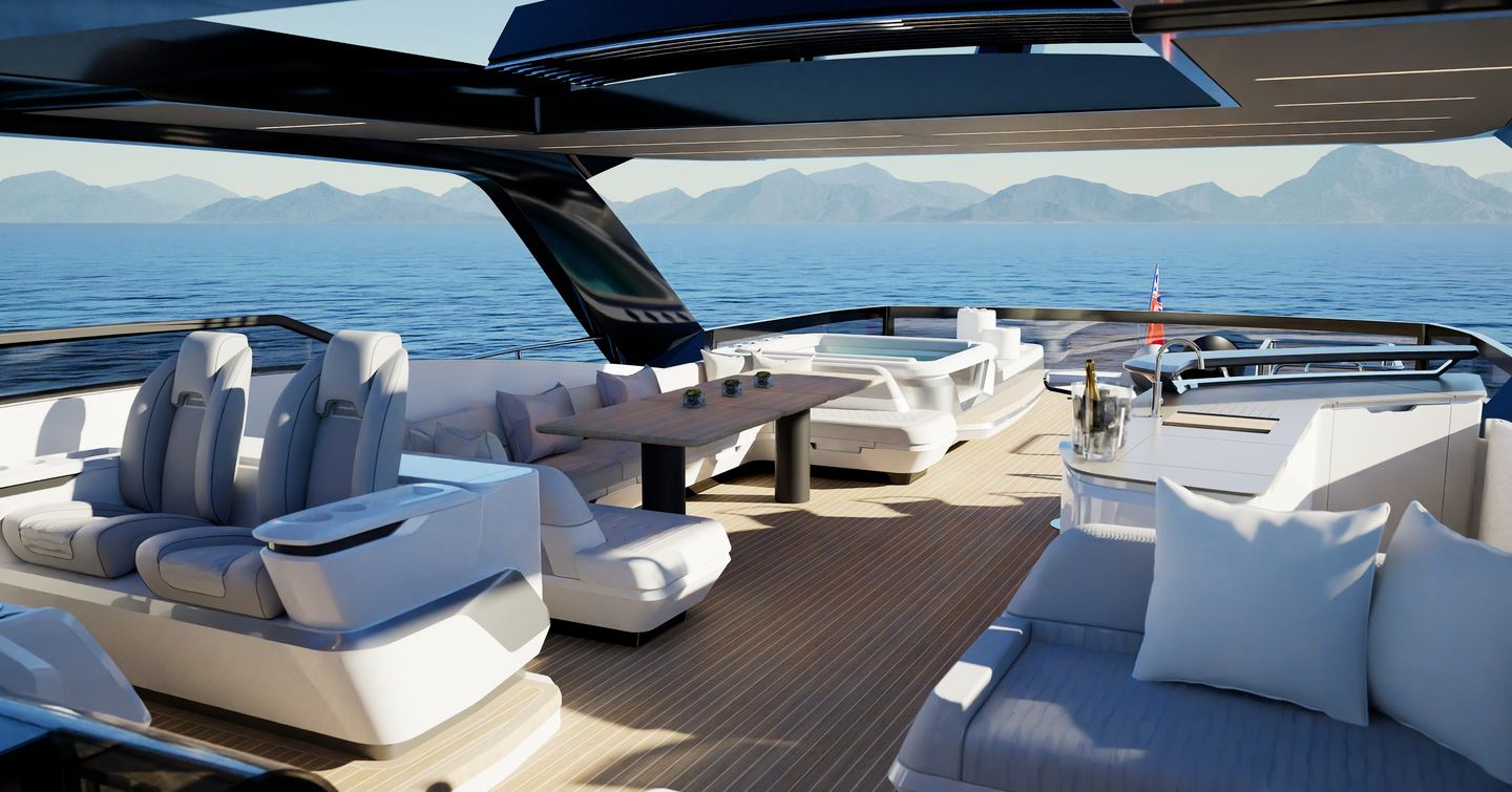 Flybridge of Pearl 100 Hybrid motor yacht with seating and dining area at sea.