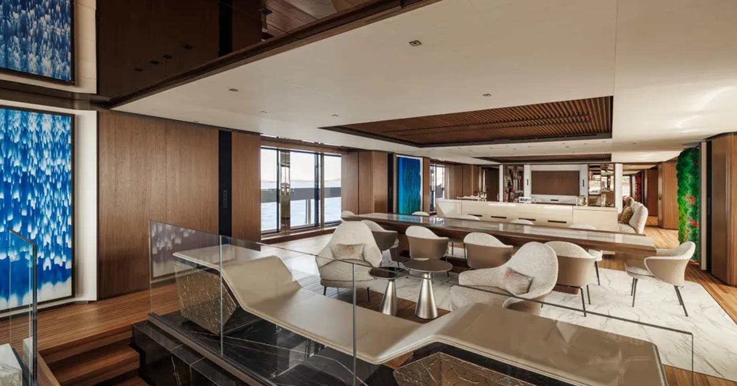 Sanlorenzo 74Steel superyacht Silver Fox main saloon with neutral palette and aft diningarea 