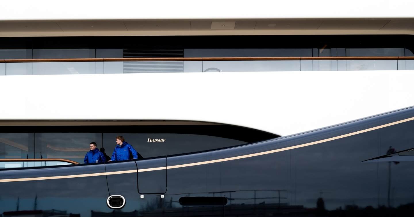 Close up of workers on board Feadship Superyacht Project 1014 during launch