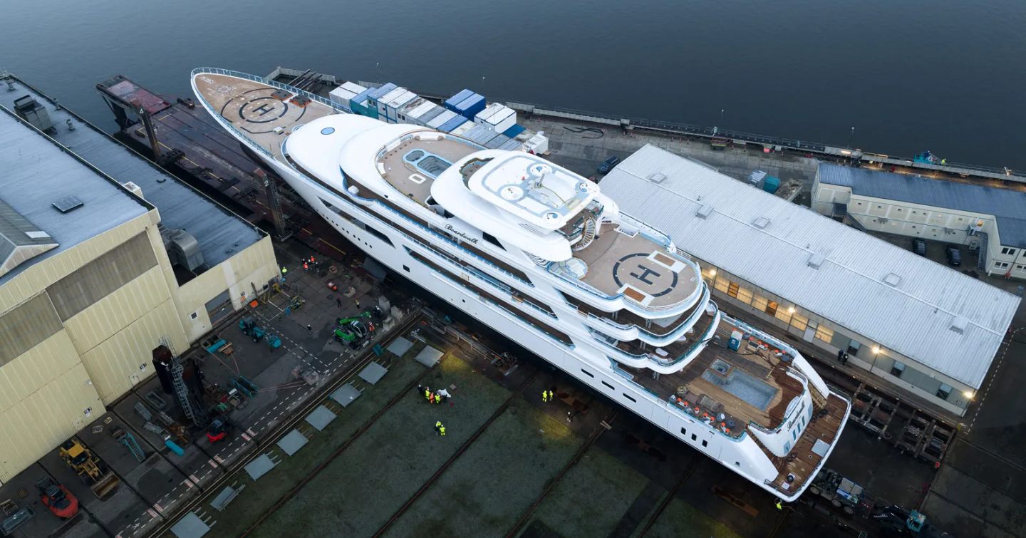  Areal drone shot of Lurssen Boardwalk leaving shed