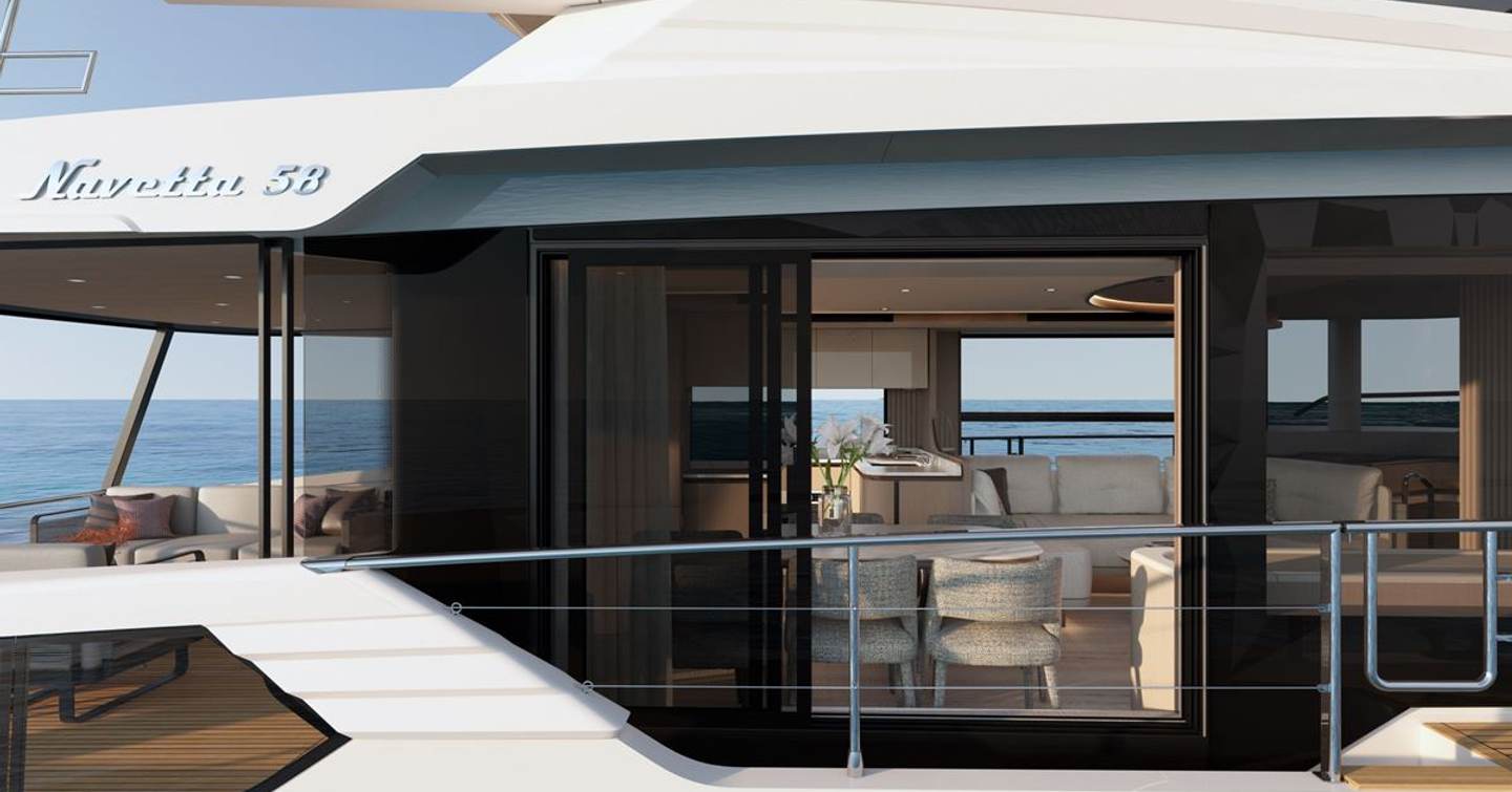 Absolute Navetta 58 motor yacht saloon close up view from exterior 