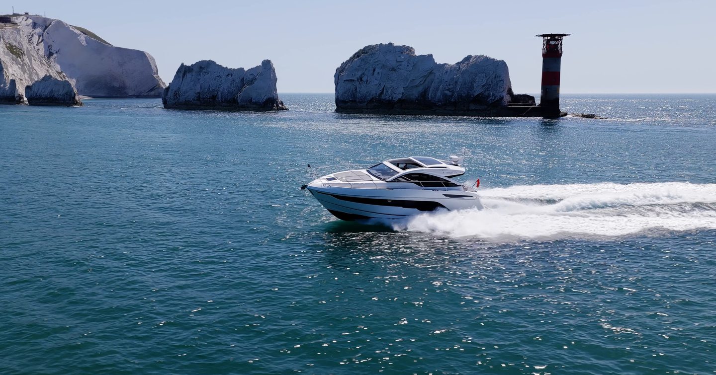Fairline Targa 47 GT cruising past the Needles Lighthouse during YachtBuyer sea trial