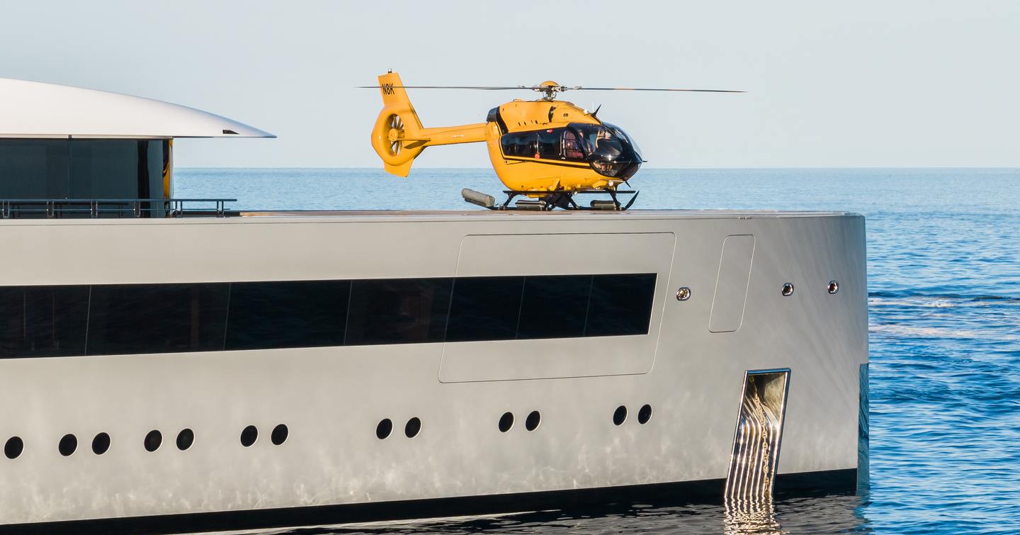 Close up of superyacht Moonrise with helicopter