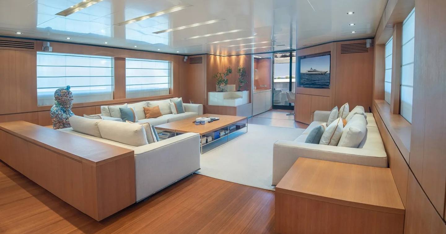  Baglietto superyacht Tin Tin main saloon with warm wood interiors 