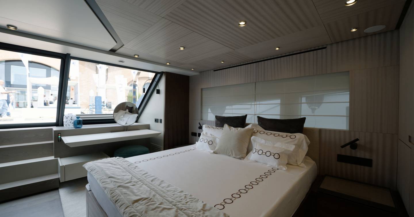 Manda S07 Berlinetta owner cabin with aft glazing and direct view toward the stern deck