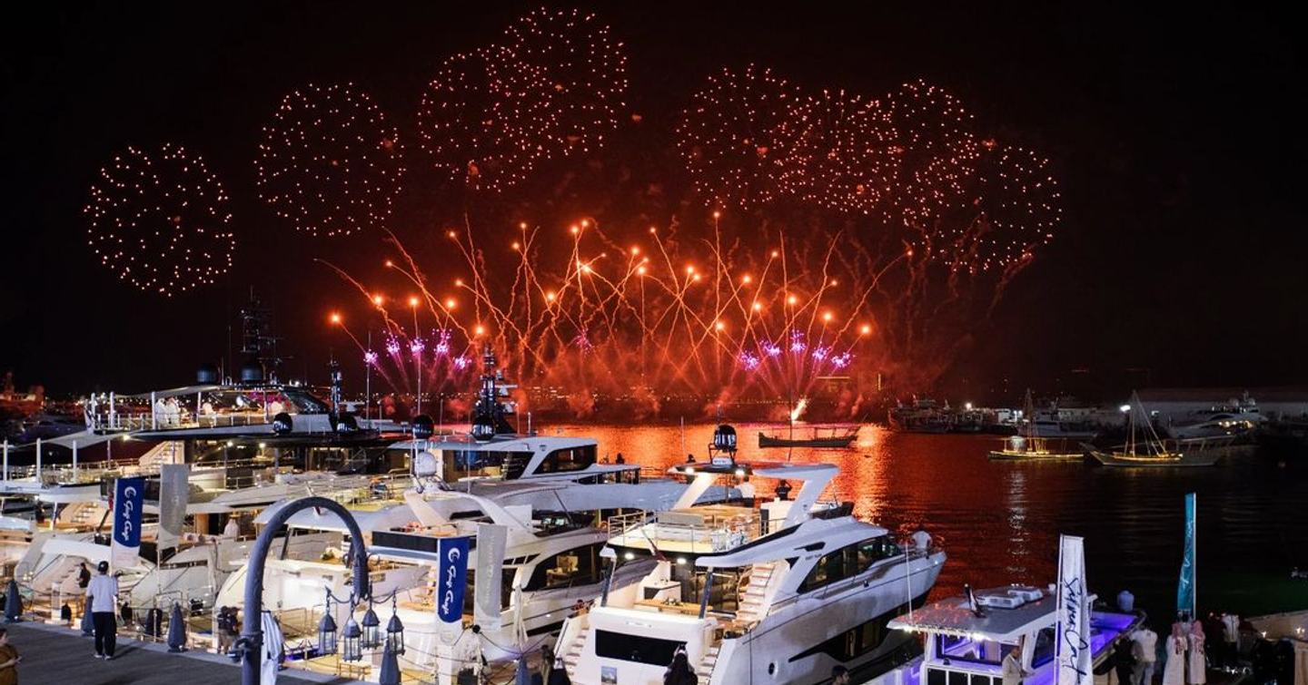 Fireworks lighting the sky over motor yachts at the Qatar Boat Show