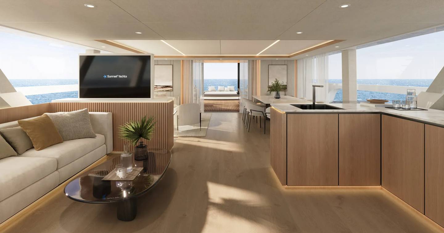 Sunreef Ultima 88 Catamaran main saloon with pop up TV and aft dining area 