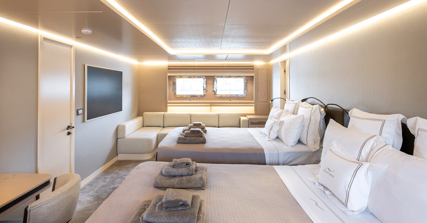 Numarine 40MXP full-beam lower deck owner's cabin with twin queen beds and opening portlights