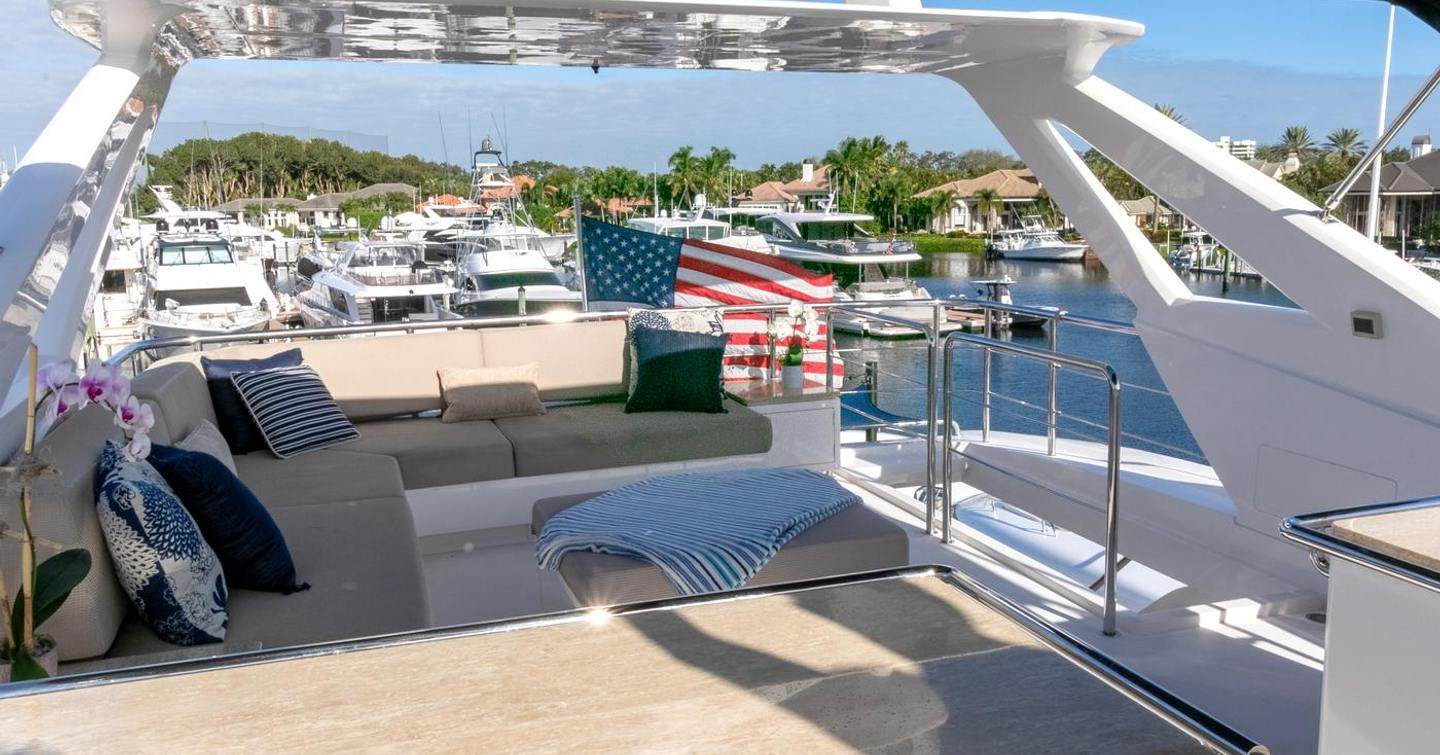 Motor Yacht One More Time sundeck with shaded seating