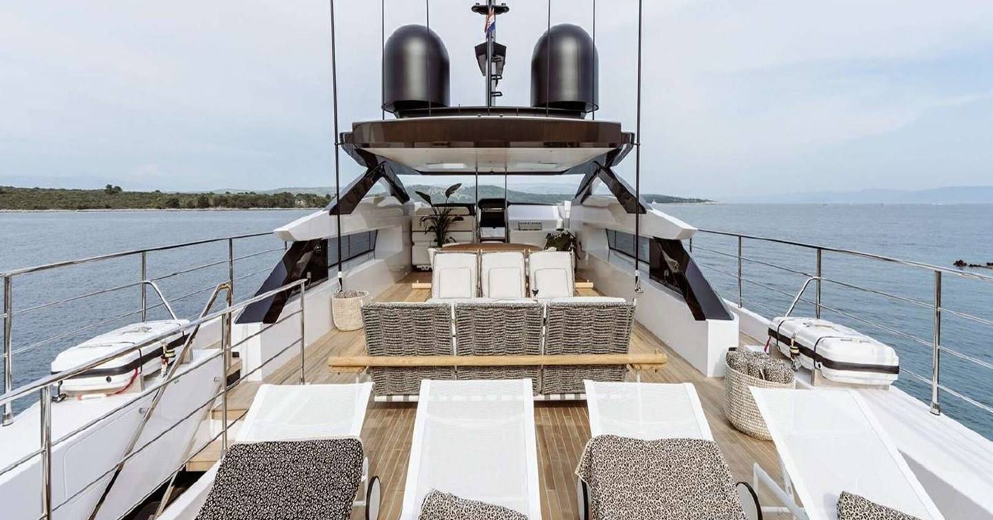 Superyacht Erolia flybridge with sunpads and shaded seating