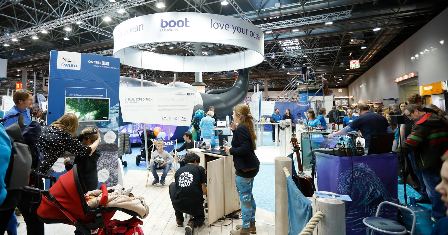 Group of people at Love YOur Ocean stand at boot Dusseldorf