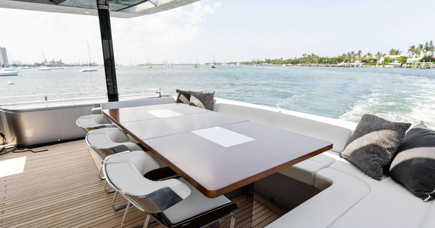 Motor yacht Chop Chop's aft shaded dining area