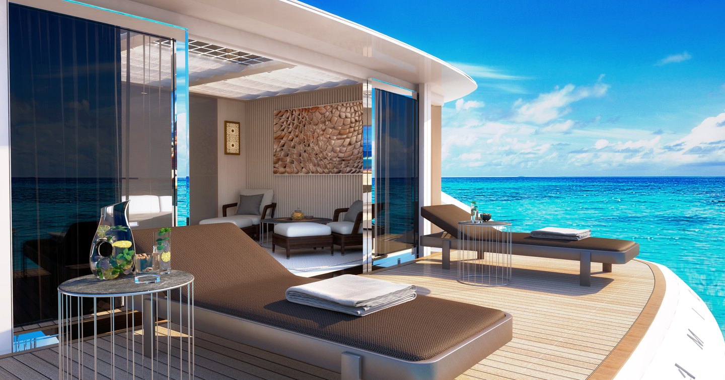 Swim platform onboard Dynamiq Yachts GTT 165, pair of sun loungers overlooking the sea with side table