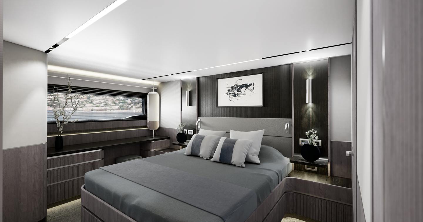 Master cabin onboard Pearl 72, central berth with night stands either side. Wide window visible to port side.