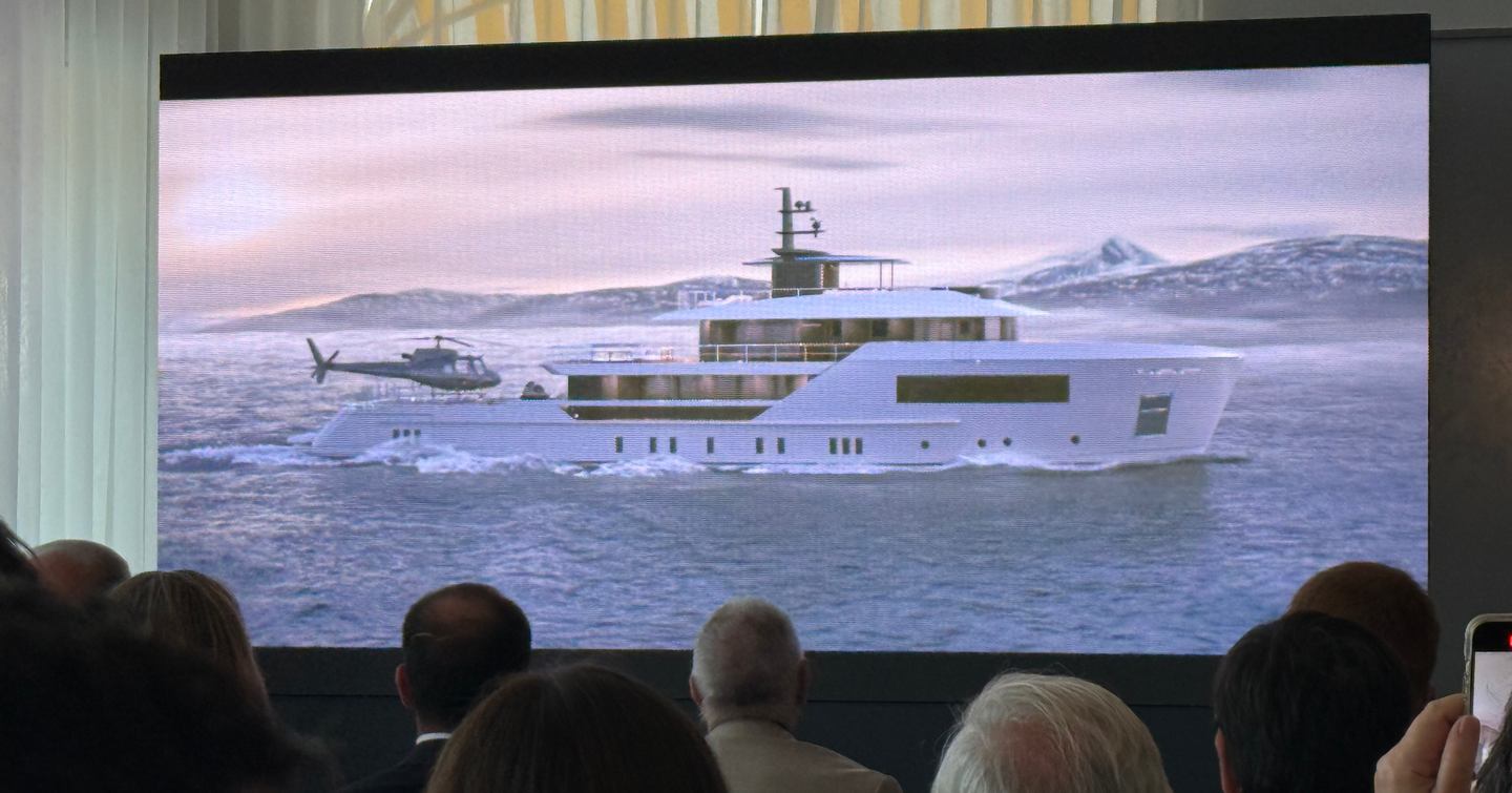 Rendering of Sanlorenzo 500EXP superyacht with helicopter landing at 2025 Cannes press conference