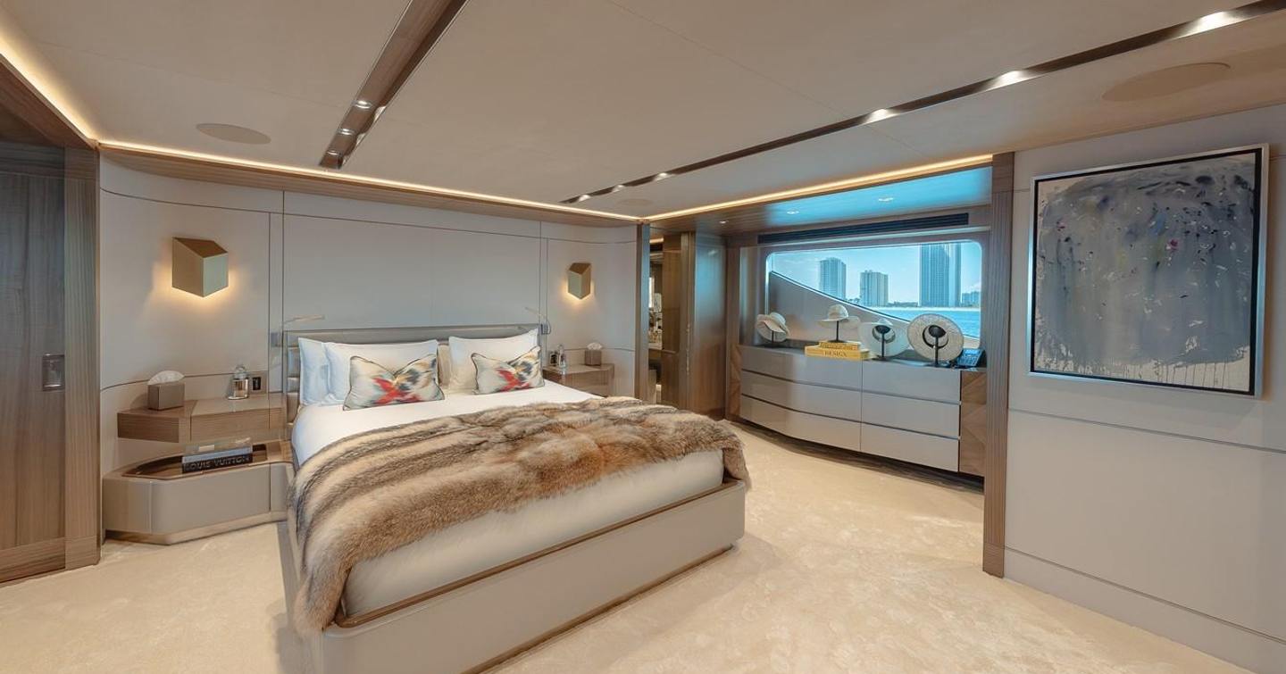  Serenity master cabin with large bed and window
