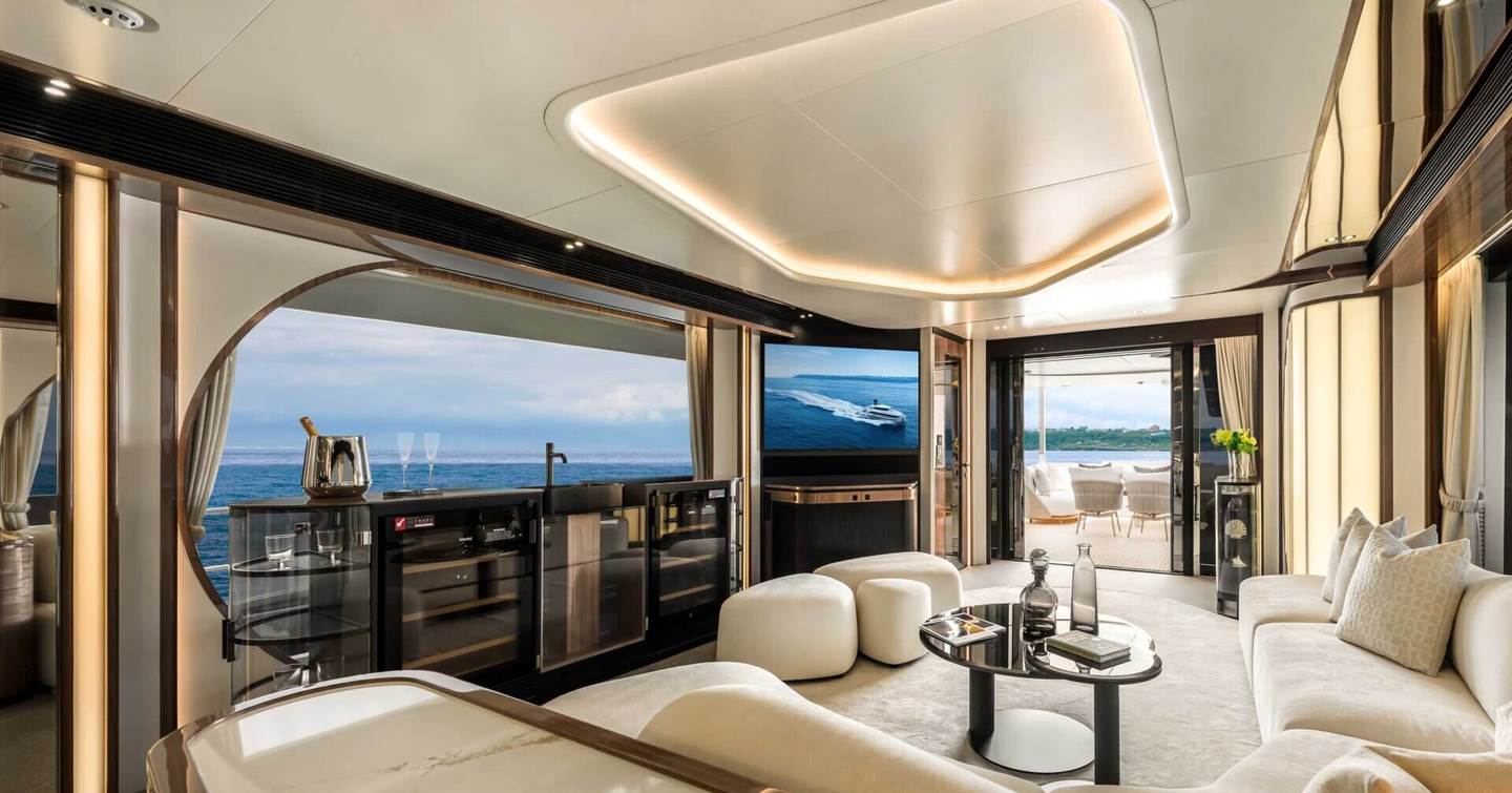Horizon FD100 Skyline Superyacht upper deck lounge with curved white seating