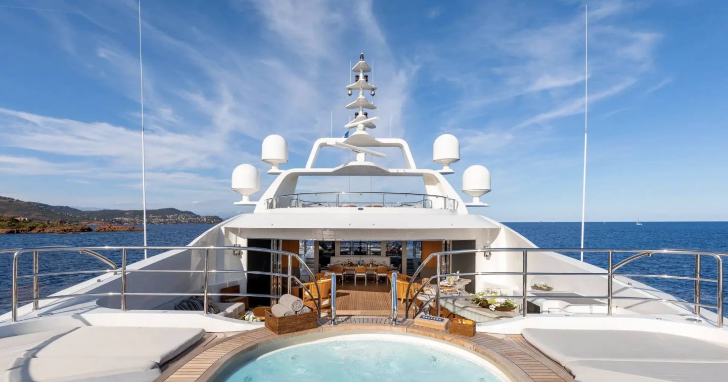 Superyacht Seanna's sundeck with jacuzzi and shaded seating 