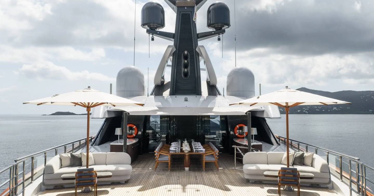 Superyacht Vanish upper deck forward with shaded seating and alfresco dining