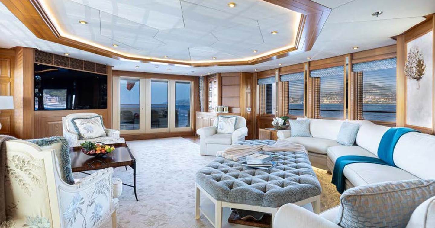 Main saloon on board motor yacht Vibrance with panoramic views and comfortable furniture 
