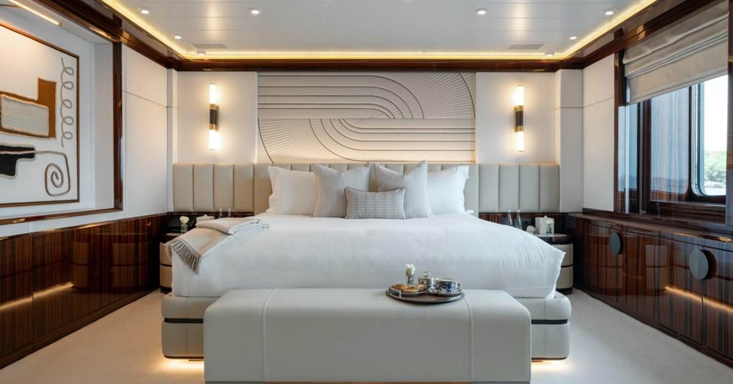 AHS owners suite bed area with big window