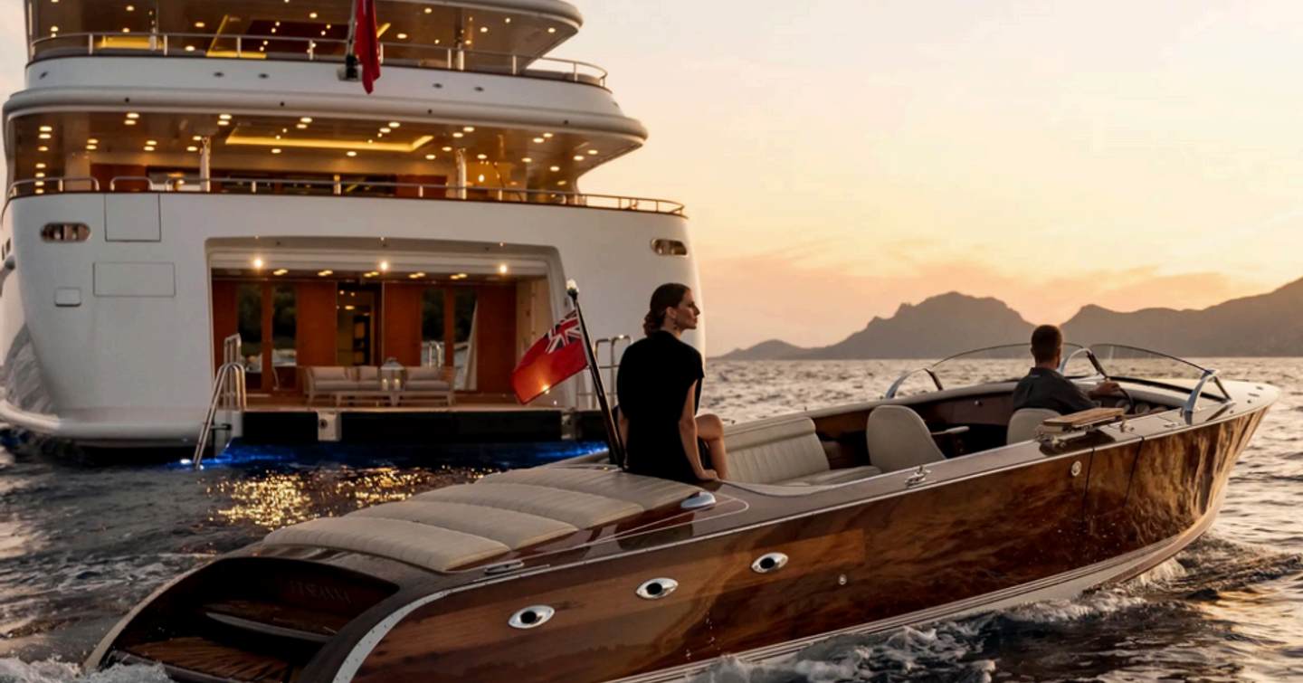 Superyacht Seanna's beach club with woman on tender 