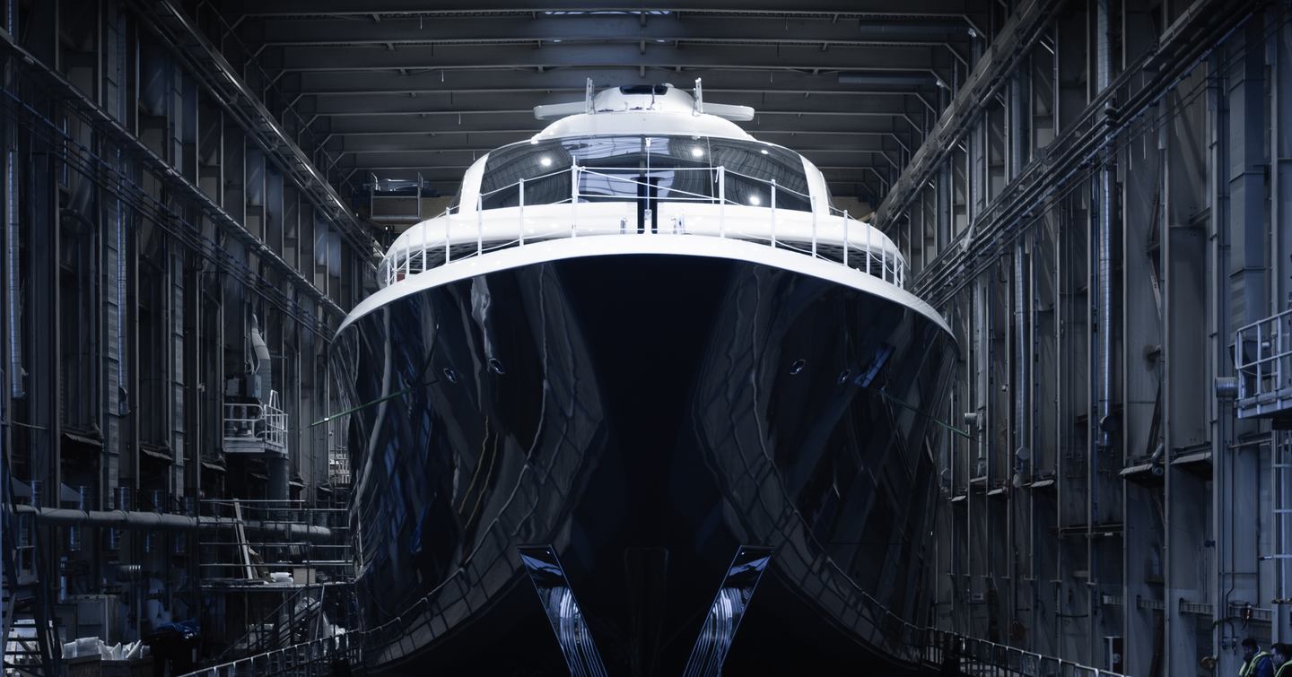 Close up of Superyacht Project 714's bow in shipyard