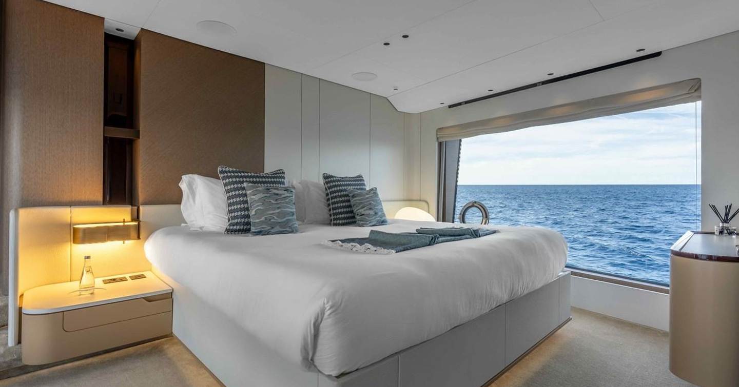 Azimut motor yacht St Jude master cabin with large window 