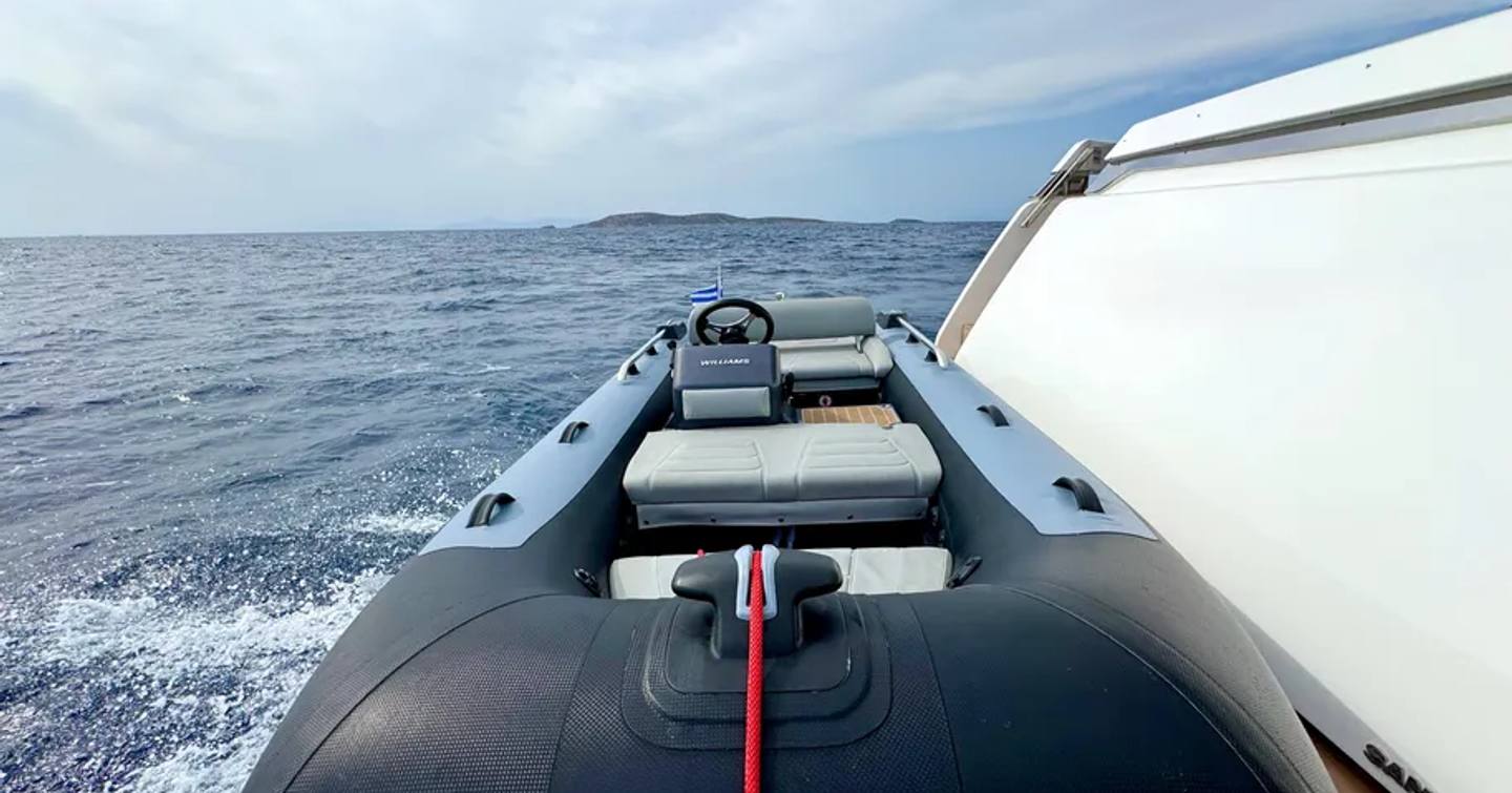 Motor yacht Judy's stern with tender