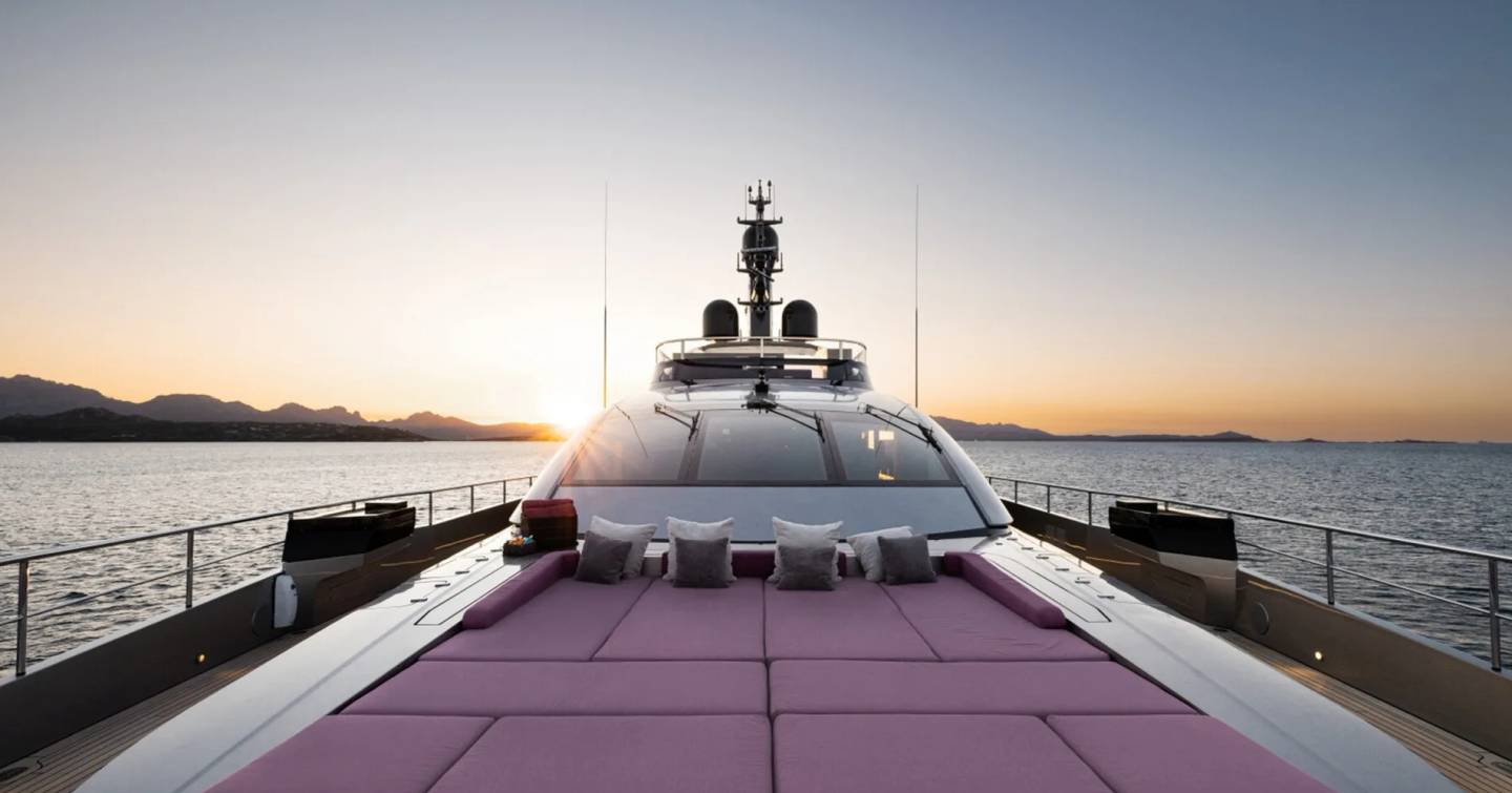 Superyacht Flying Dagger III foredeck with purple sunpads 