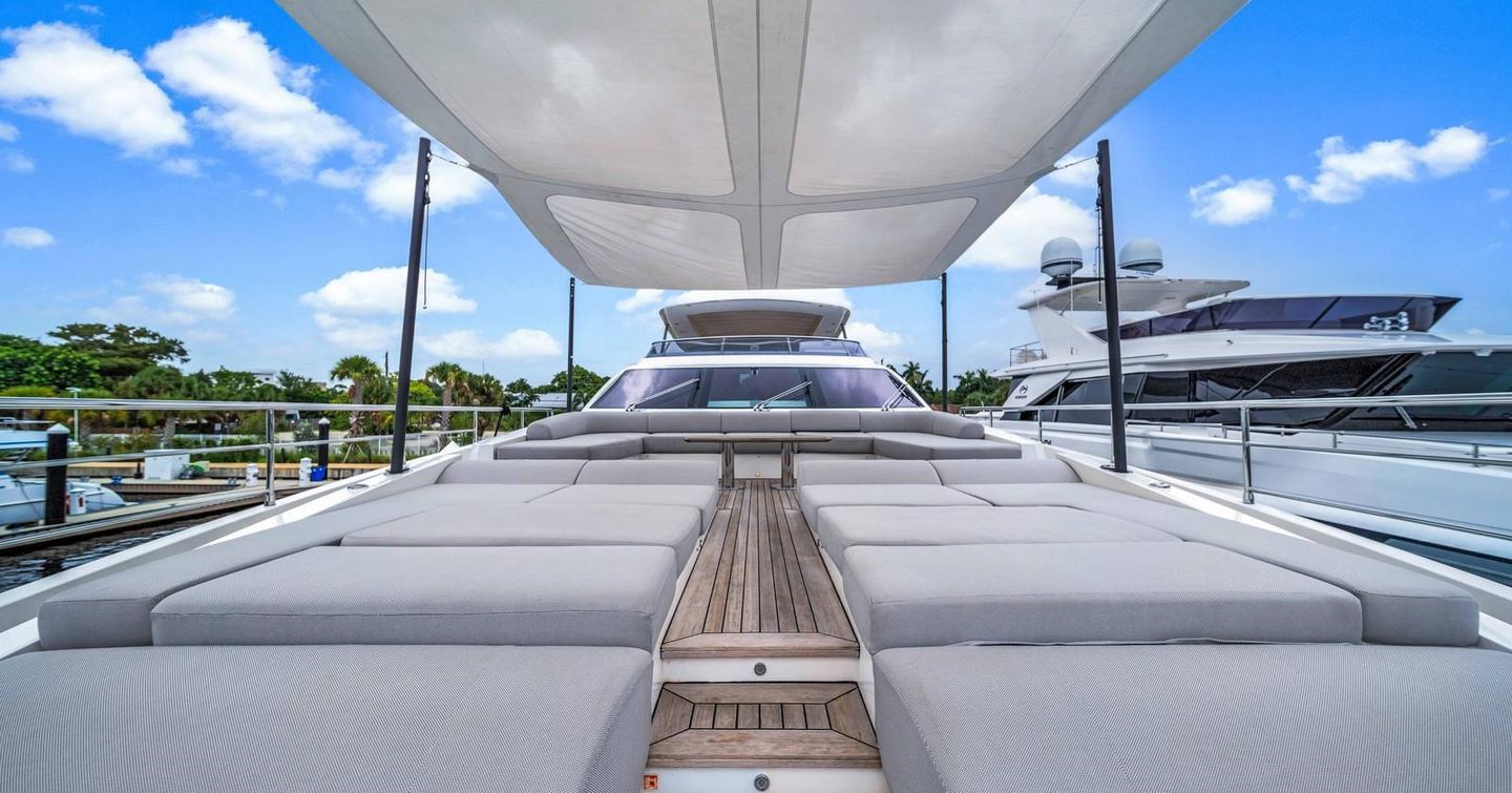 Superyacht One & Only foredeck with canopy and grey sunpads 