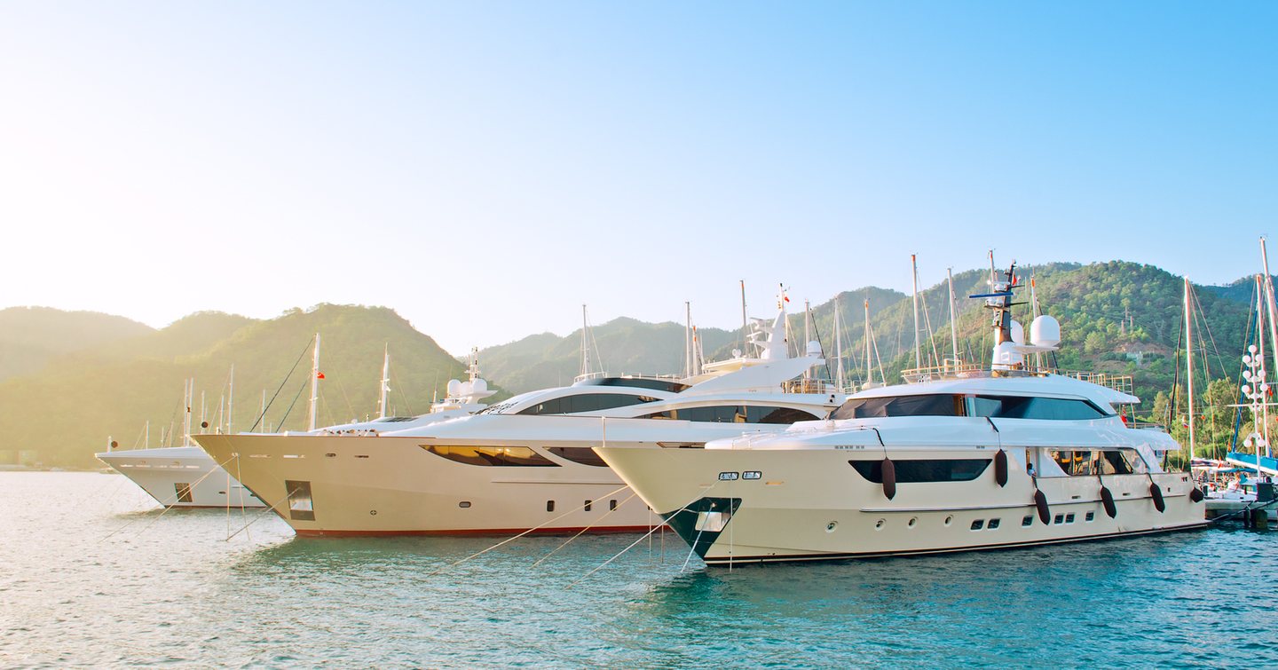 Superyachts moored at a marina 