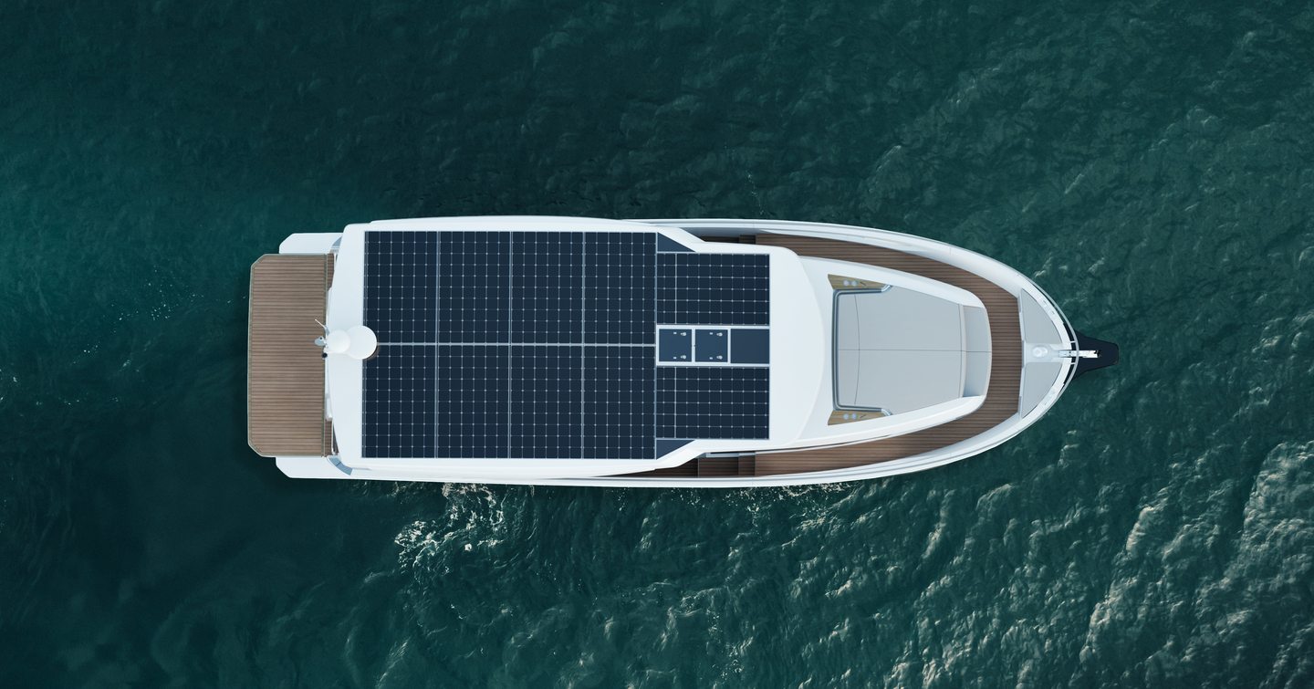 Aerial top view of Greenline 42 hybrid yacht showing full solar panel array on coachroof