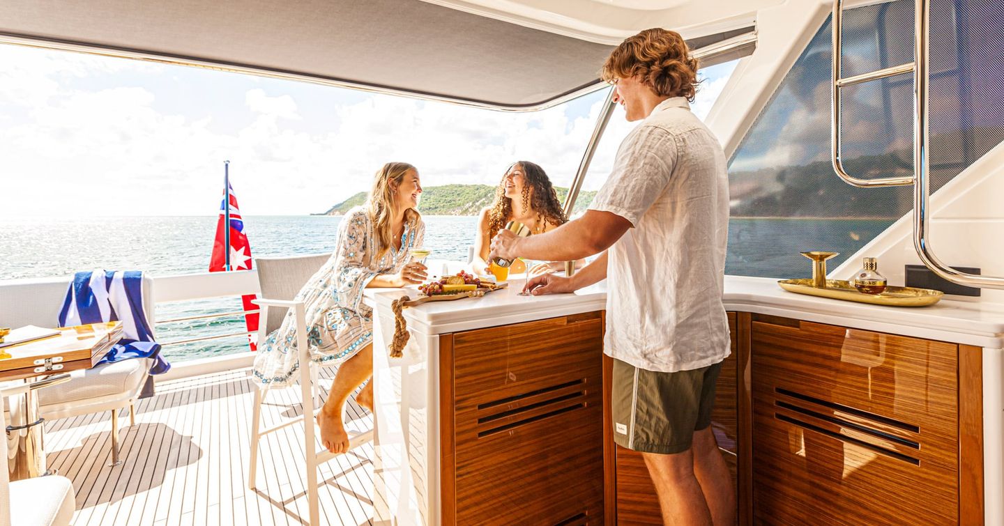 Riviera-78-Motor-Yacht-Enclosed-Bridge-Deck-Review-aft-deck-lifestyle