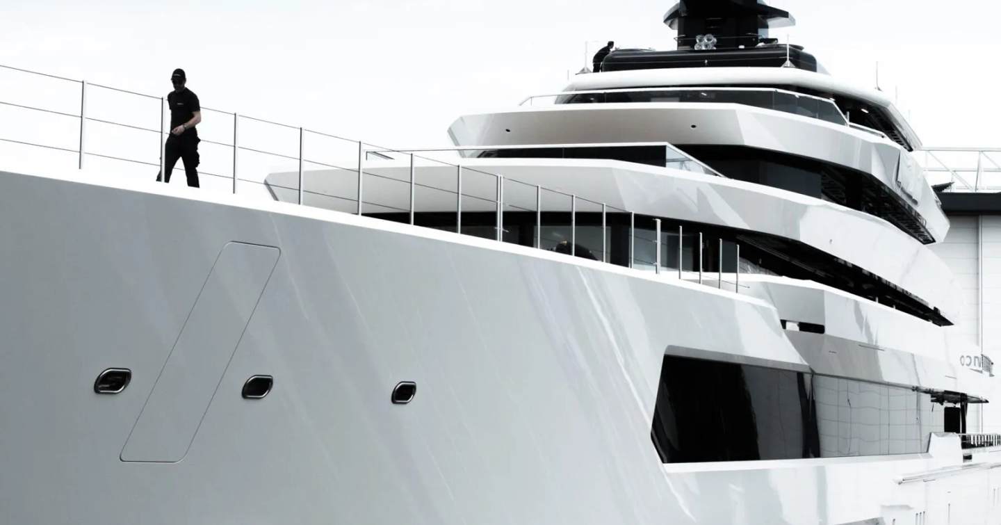 Silhouette of man walking on foredeck on board Superyacht DreAMBoat 