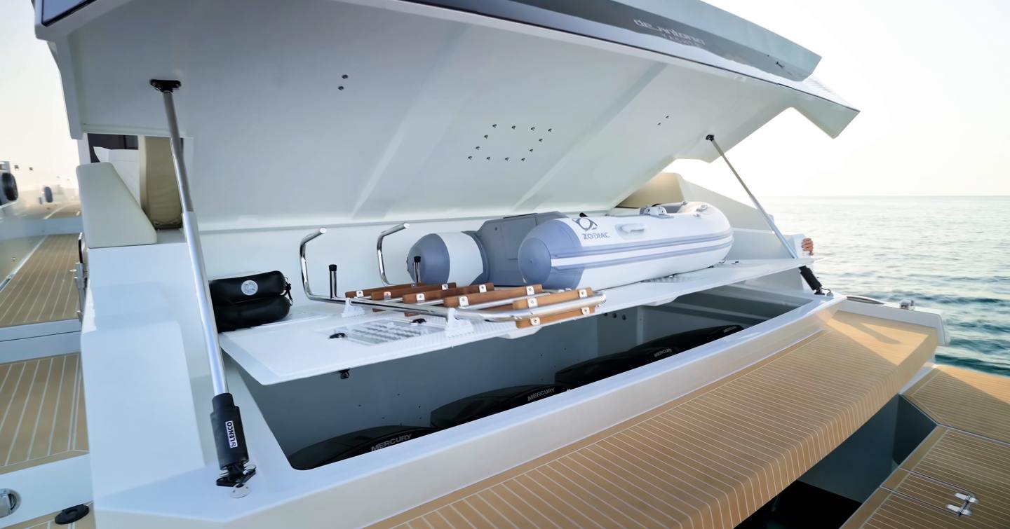 De Antonio D60 tender garage above concealed quad outboard setup