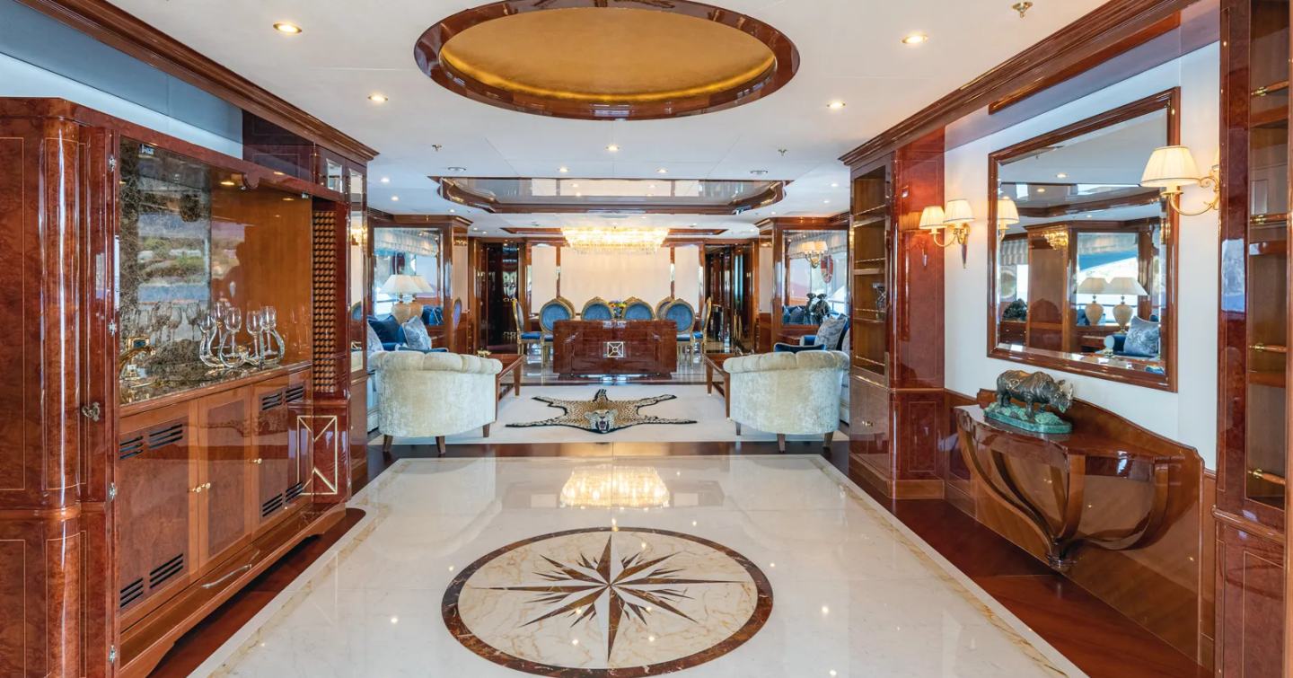 Superyacht Rhino main salon with marble compass emblem on floor