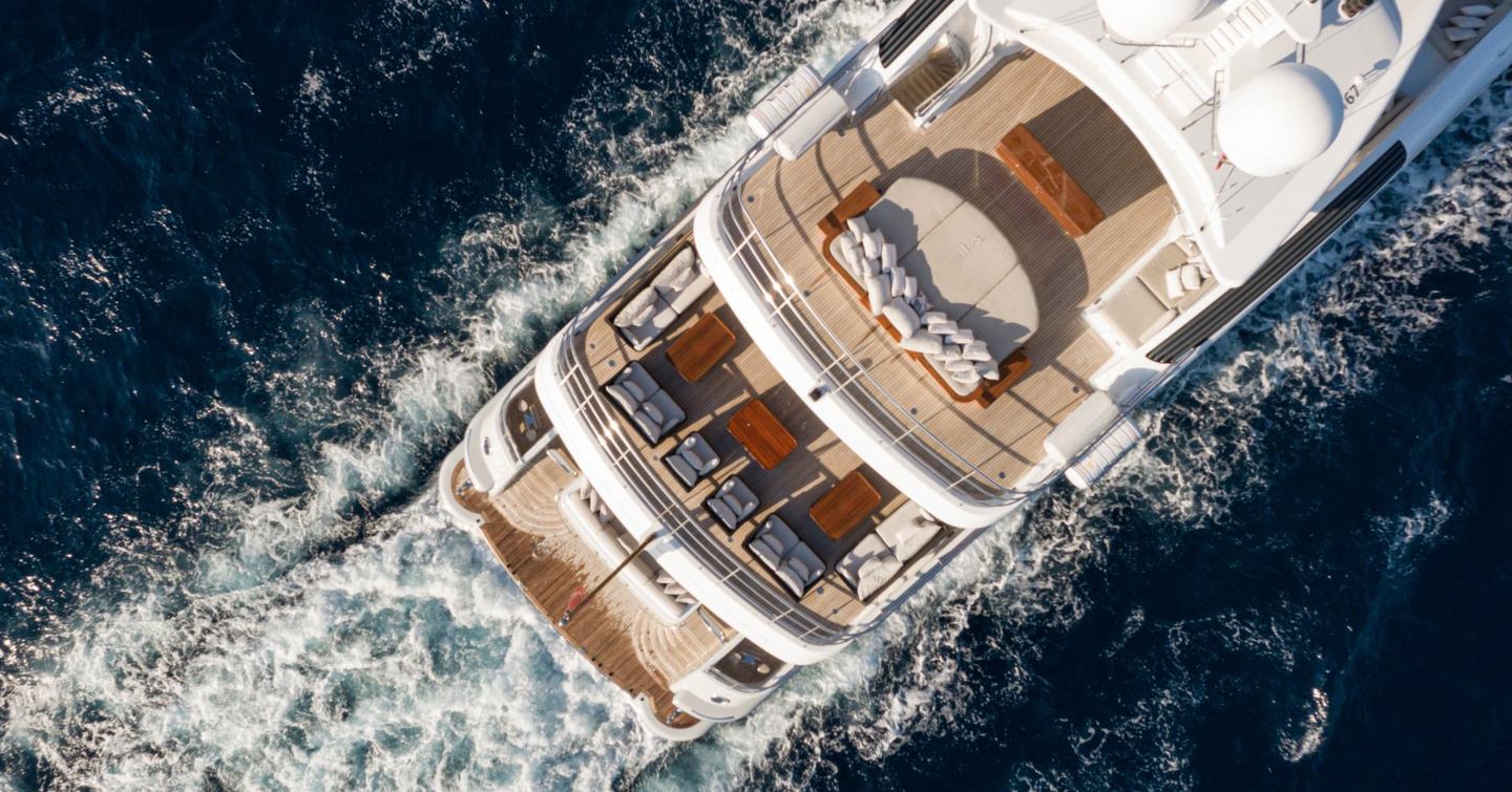 Aerial view of stern Superyacht Were Dreams under way 
