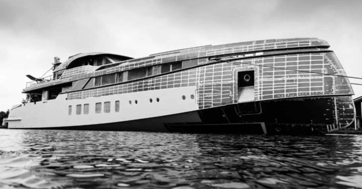 Feadship Project 706 at anchor during construction,surrounded by sea