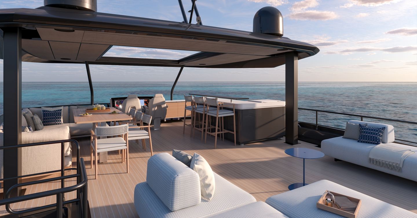 Prestige M8 Evo catamaran flybridge lounge and dining area 