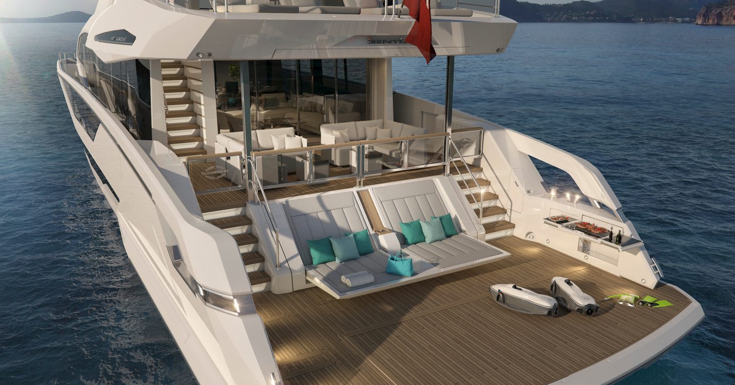 spacious swim platform with sunning area and steps that lead up to main deck aft on board the Pearl 62 yacht